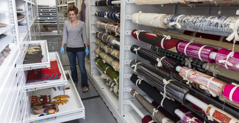 Assistant Curator Krista Barry'15 in the textile storage area of the Logan Museum of Anthropology...